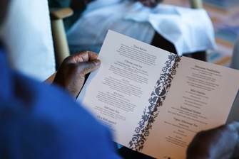 Fred. Olsen Cruise Line Guest looking at the Afternoon tea menu.jpg